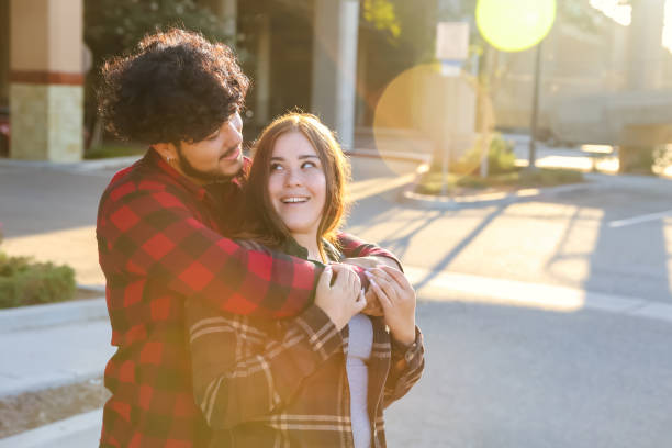 istock Young hispanic couple at a train station 1412519658