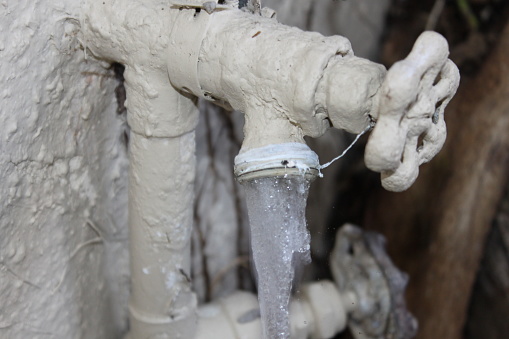 Outdoor Hose Faucet outside house.