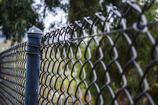 Outdoor black chainlink fence with low aperture