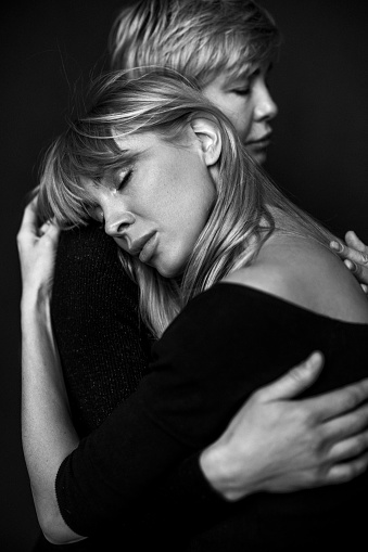 Mother and daughter. Studio shoot