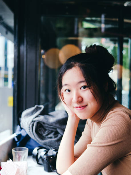 istock Asian beautiful woman smiling at camera 1412524788