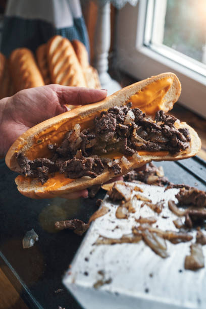 istock Preparing Chili Cheese Steak Sandwich Philly Style 1412524876