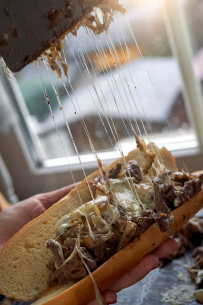 istock Preparing Chili Cheese Steak Sandwich Philly Style 1412524945