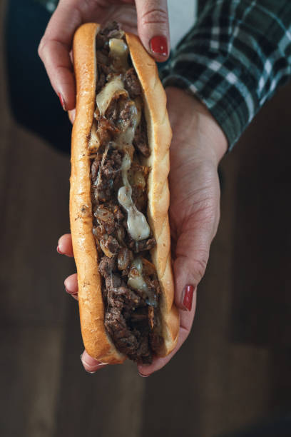 istock Preparing Chili Cheese Steak Sandwich Philly Style 1412524983