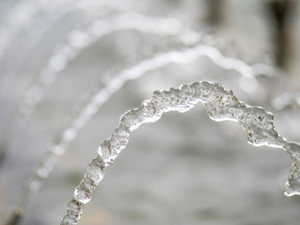 istock Splashes of water against light background. 1412526956