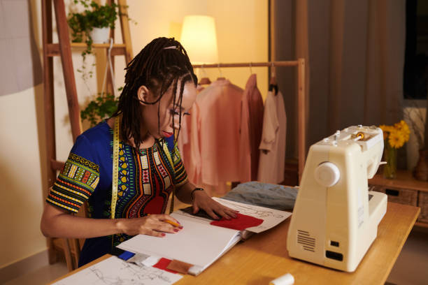 istock Designer Choosing Samples of Fabric 1412528877