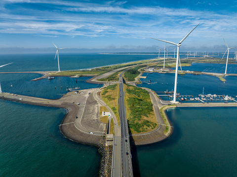 Neeltje Jans is an artificial island built on the Western side of the Netherlands which serves to protect the mainland with the storm surge bridge and also contains a small port and amusement park.