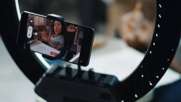 istock Woman with a disability drawing on camera 1412532066