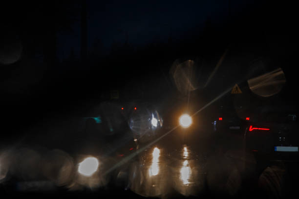istock poor visibility on a rainy night on a motor road. through the windshield 1412533057