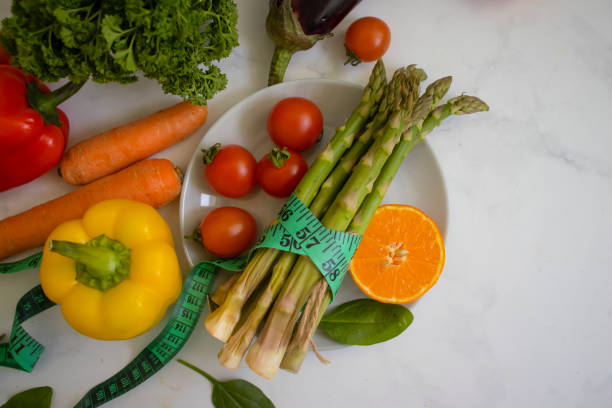 istock Measuring tape vegetables and fruits 1412534804