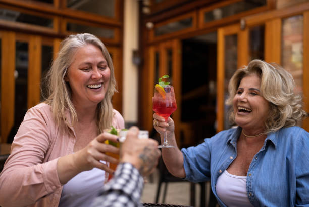 istock Friends talking and having fun at a bar 1412539258