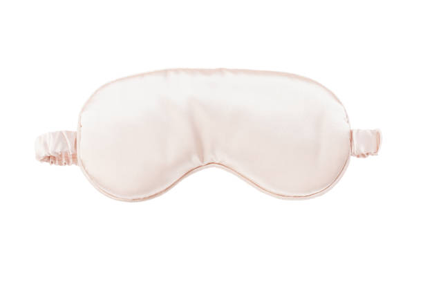 Sleeping mask isolated on white background, insomnia concept