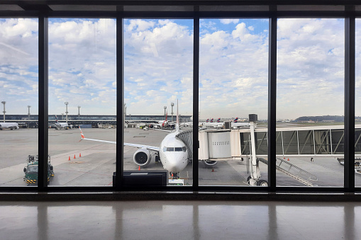 São Paulo, SP, Brazil - June 15, 2022: Aircraft waiting for boarding at Congonhas airport patio