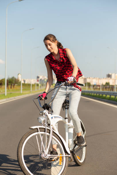 istock young woman cyclist 1412541304