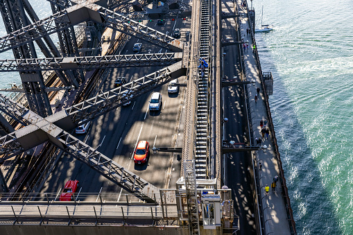 Closeup aerial view of Harbour Bridge Cahill Expressway with cars and people, full frame horizontal composition