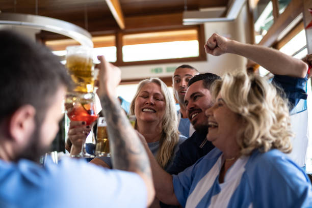 istock Argentinian team fans celebrating in a bar 1412548040
