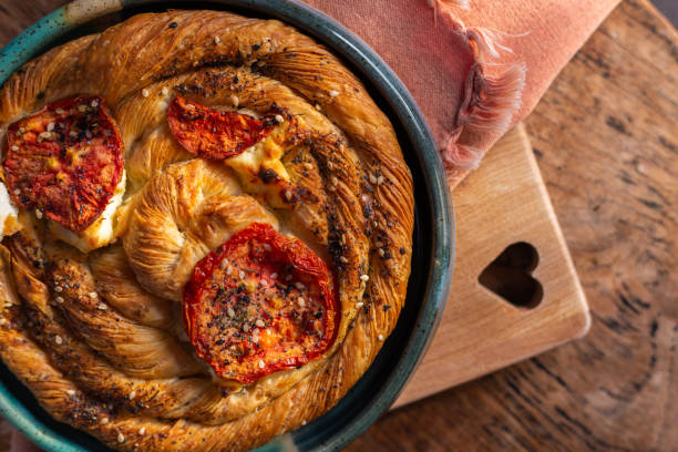 istock Close up savory breakfast pastry on wood 1412549511