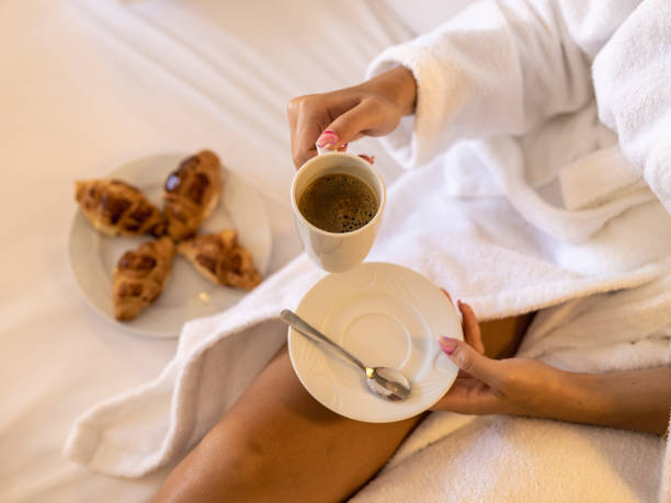 istock breakfast with croissant and coffee in hotel room 1412551613
