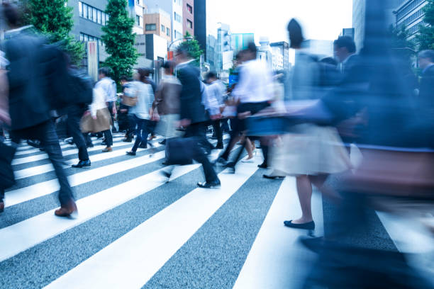 istock Tokyo Crosswalk Scene With Blur Motion 1412553645