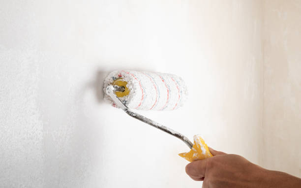istock paint roller for painting walls, house renovation concept 1412557237