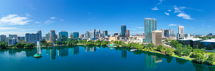 Aerial Panorama of Orlando skyline and reflection in Lake Eola.