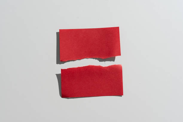 istock Ripped Sticky Note With Important Messages Presented On Desk. Teared Apart Memo With Two Different Crutial Informations. Recent Announcements Presented. 1412562641