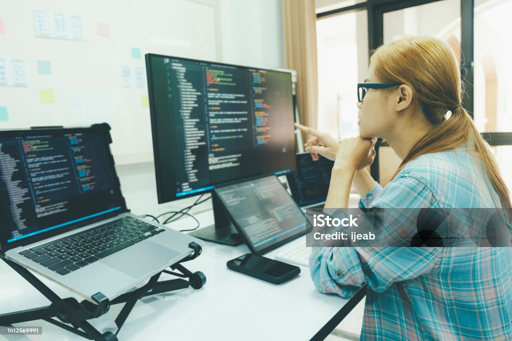 Programmer Is Coding And Programming Software Stock Photo - Download ...