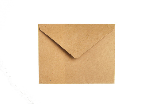 Brown craft envelope isolated on white background. Craft eco envelope on white background. Christmas holiday concept. Letter to Santa Claus. White background. Isolated.
