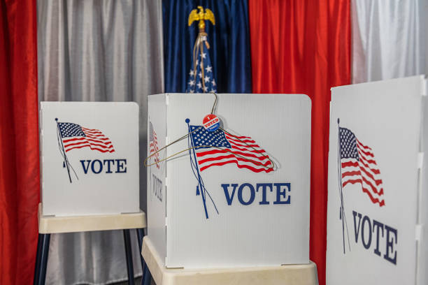 istock A folded metal coat hanger with I vote today sticker 1412572228
