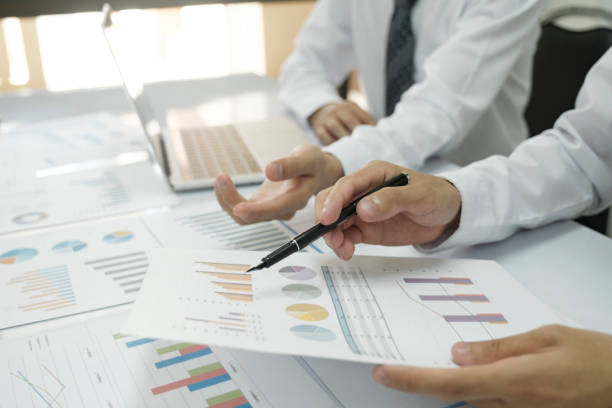 istock Businessman teamwork is thinking and analyse planing the strategy. 1412572301