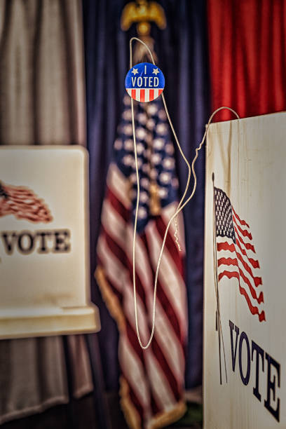 istock An opened metal coat hanger with I vote today sticker 1412572329