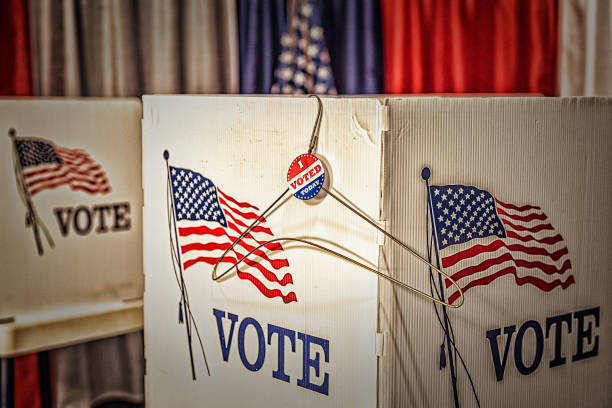 istock A folded metal coat hanger with I vote today sticker 1412572346