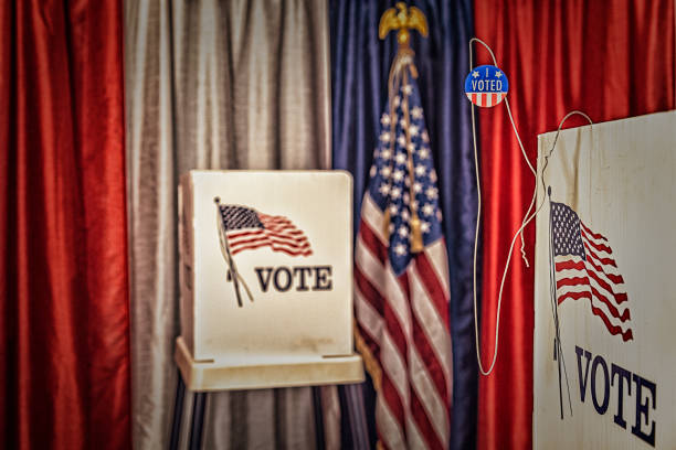 istock An opened metal coat hanger with I vote today sticker 1412572403