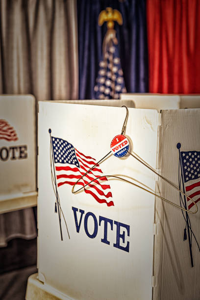 istock A folded metal coat hanger with I vote today sticker 1412572463