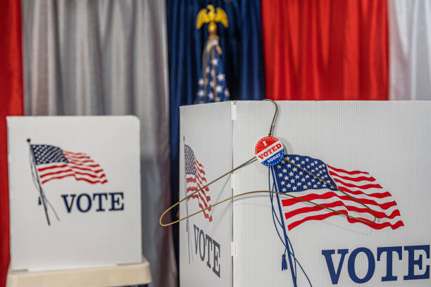 istock A folded metal coat hanger with I vote today sticker 1412572526