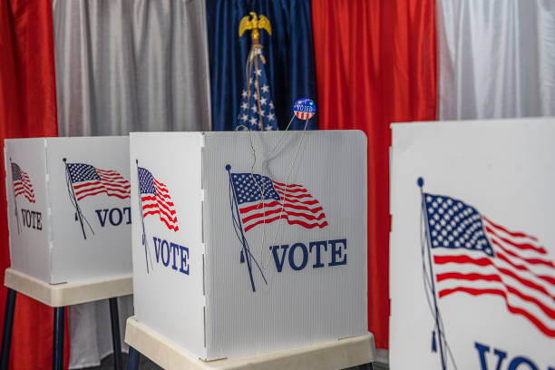 istock An opened metal coat hanger with I vote today sticker 1412572561