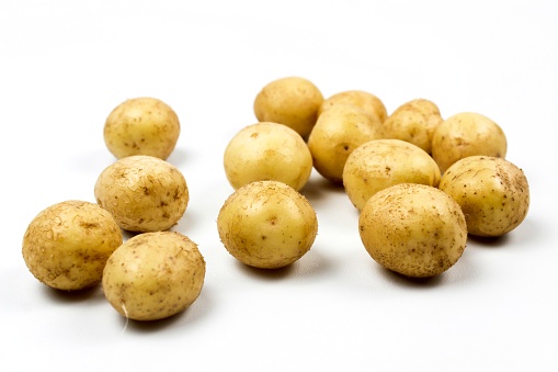 small potatoes on a white background