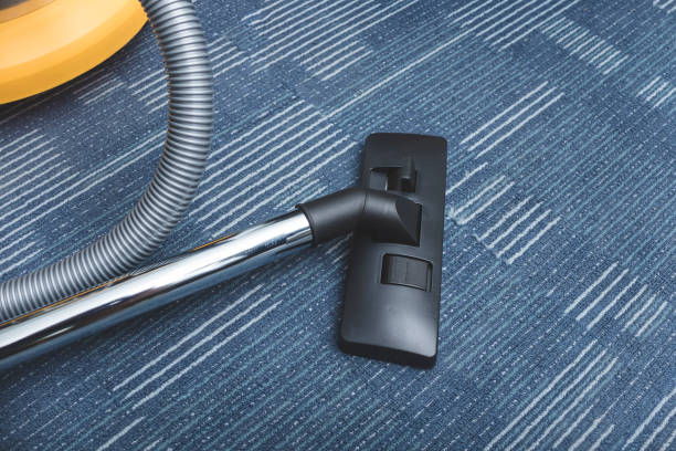 istock A Vacuum Cleaner with a Floor Carpet Brush Nozzle attachment. 1412575616