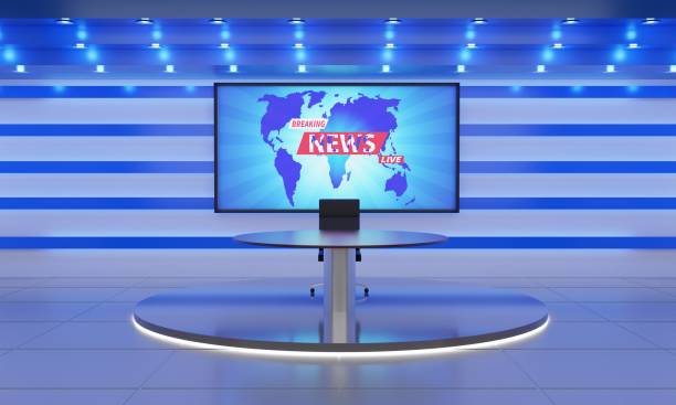 istock wooden table on stand with led screen background in a news studio room.3d rendering. 1412576533