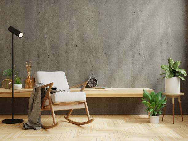 istock Modern minimalist interior with a gray armchair on empty cement wall background. 1412577916