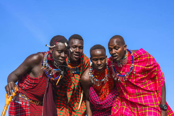 istock Maasai Mara man showing traditional Maasai jumping dance 1412580751