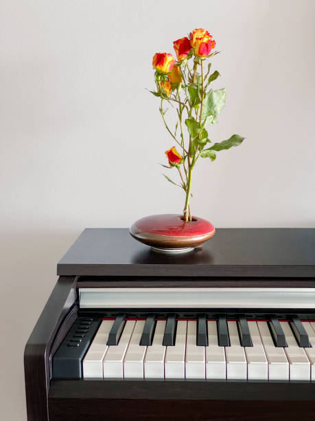 istock Piano and roses 1412581592