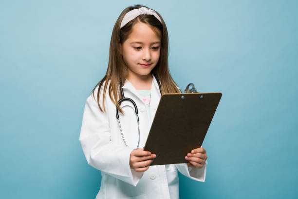 istock Smart kid wants to study medicine to become a doctor 1412583383