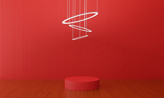 red stand and spotlight in the red room.3d rendering.