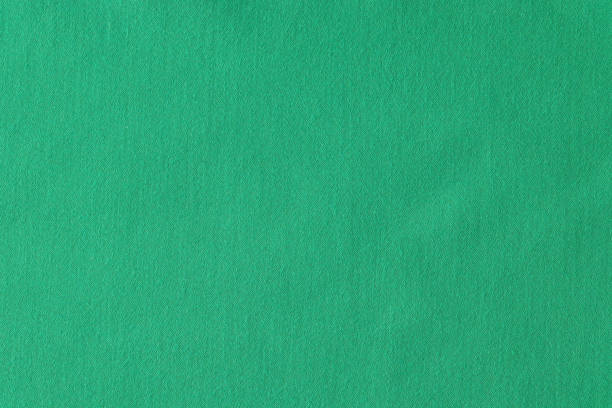 istock Poker table felt background in green color 1412584652