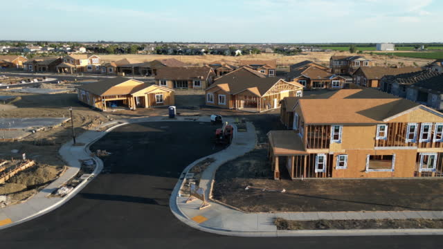 Aerial view of a new modern residential houses under construction in Northern California, USA