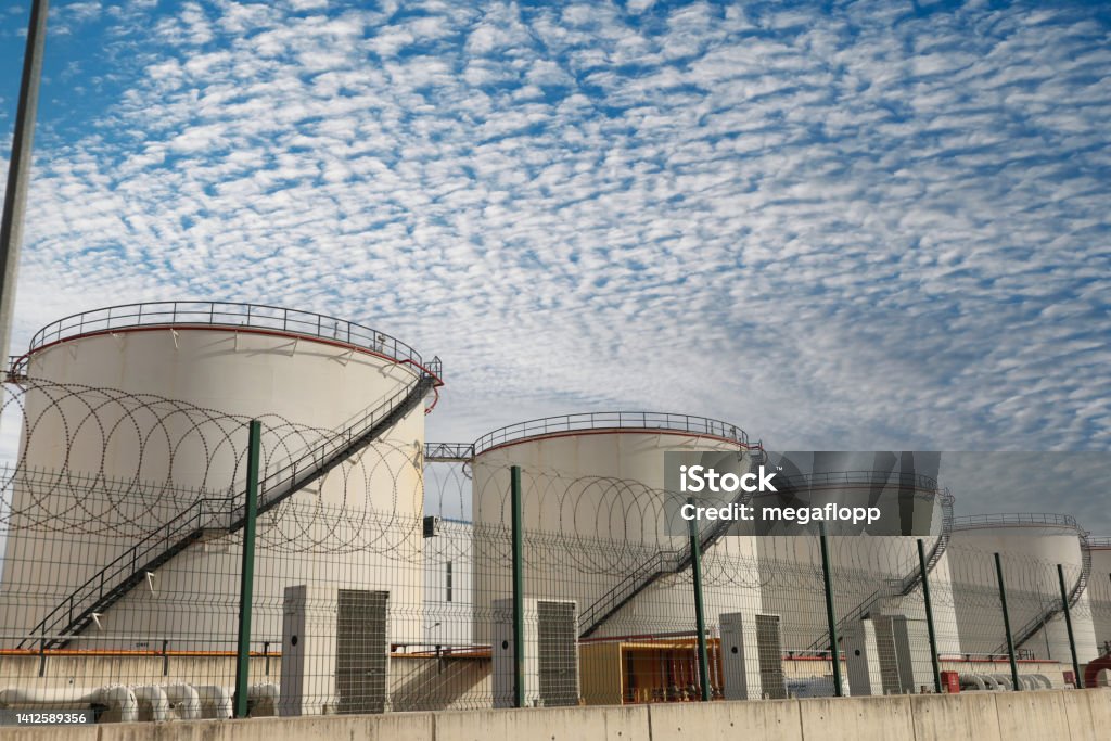 Liquefied natural gas or oil industry. Tanks Lpg for storage and storage of petroleum products Liquefied natural gas or oil industry. Tanks Lpg for storage and storage of petroleum products. Technology of a modern oil refinery. Crude Oil Stock Photo