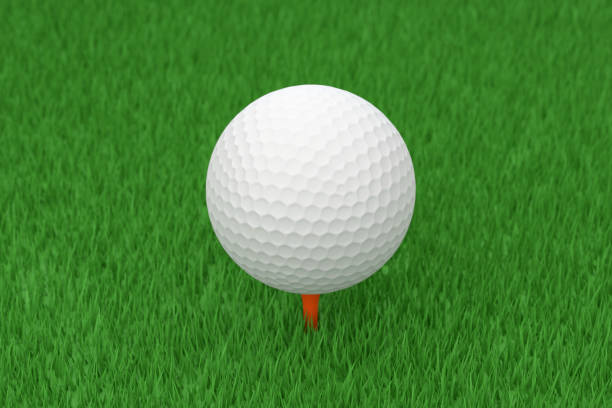 Golf ball at grass, close-up, selective focus, no people