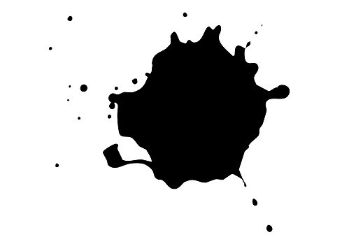 Black blot on a white background. Spots of ink on a piece of paper.