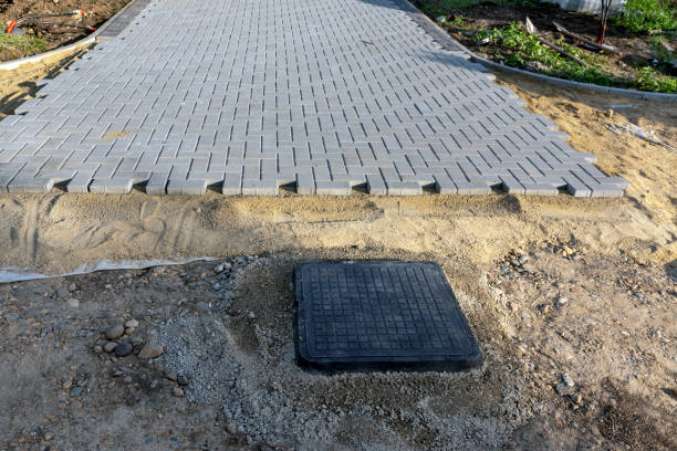 istock Laying paving slabs at a construction site. 1412594535